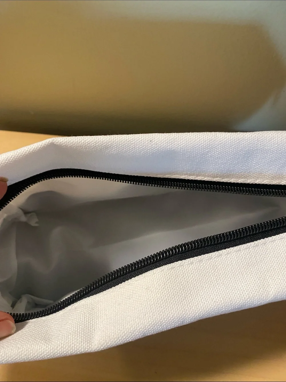 Initial N black and white lined toiletry bag